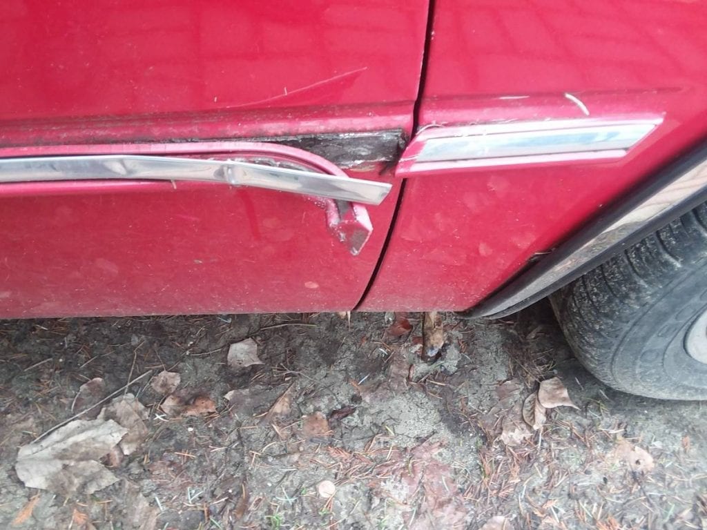 damaged trim on car door