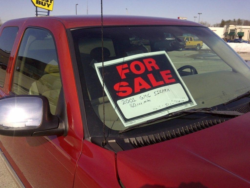 for sale sign in car windshield