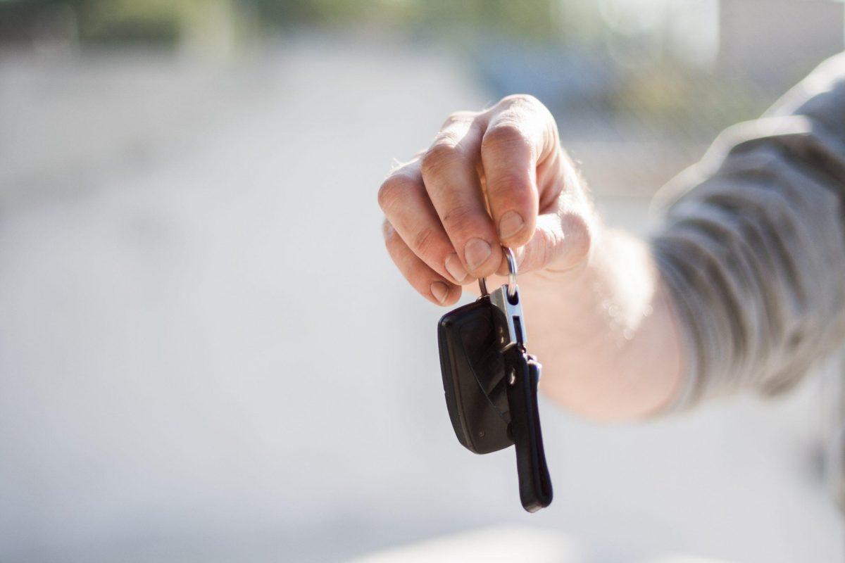 used car buyer holding car keys