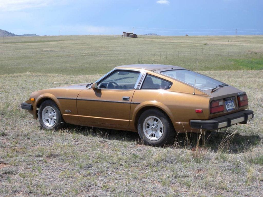 1979 Datsun 280ZX parked in a field