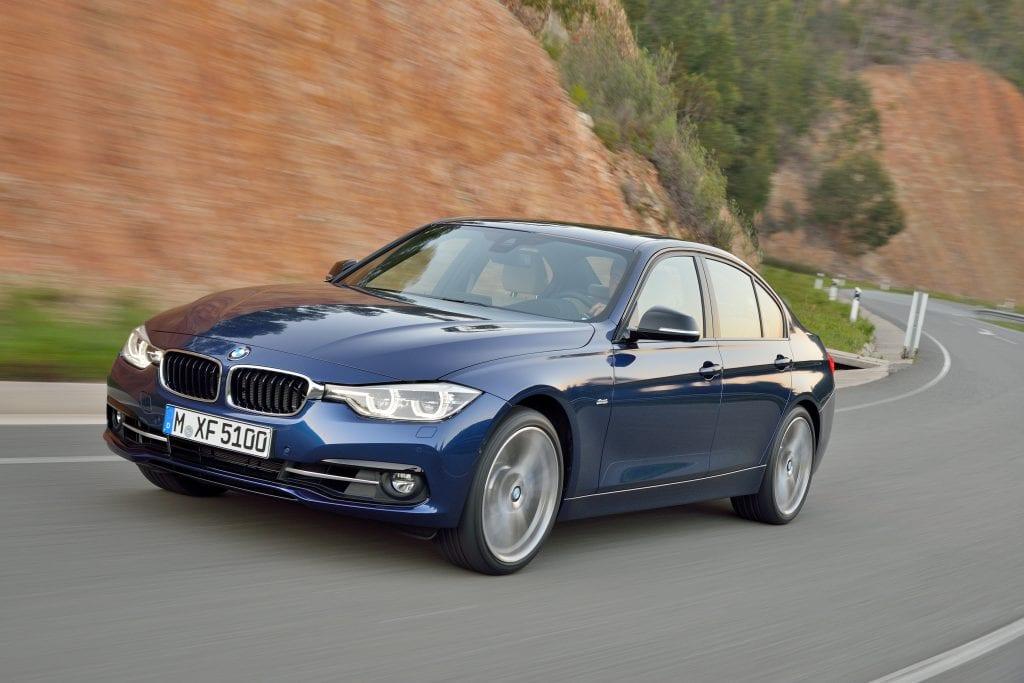 BMW F30 3 Series driving through the mountains