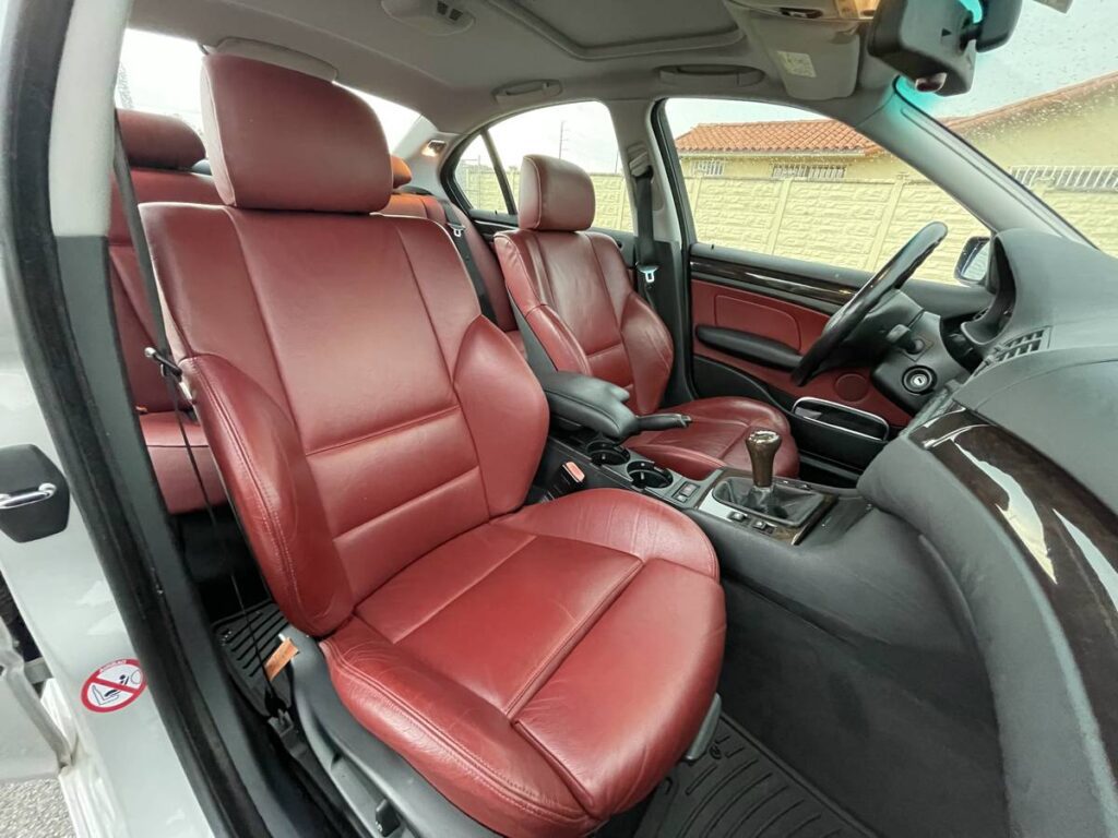 2001 BMW 325i with red interior