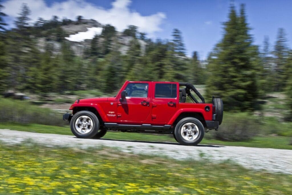 2015 Jeep Wrangler Unlimited Sahara driving on gravel
