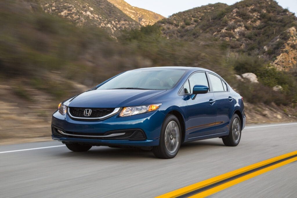 2015 Honda Civic sedan driving on road