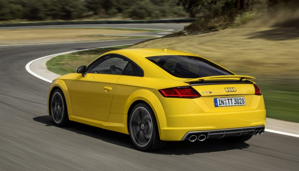 2016 Audi TTS Coupe driving on racetrack