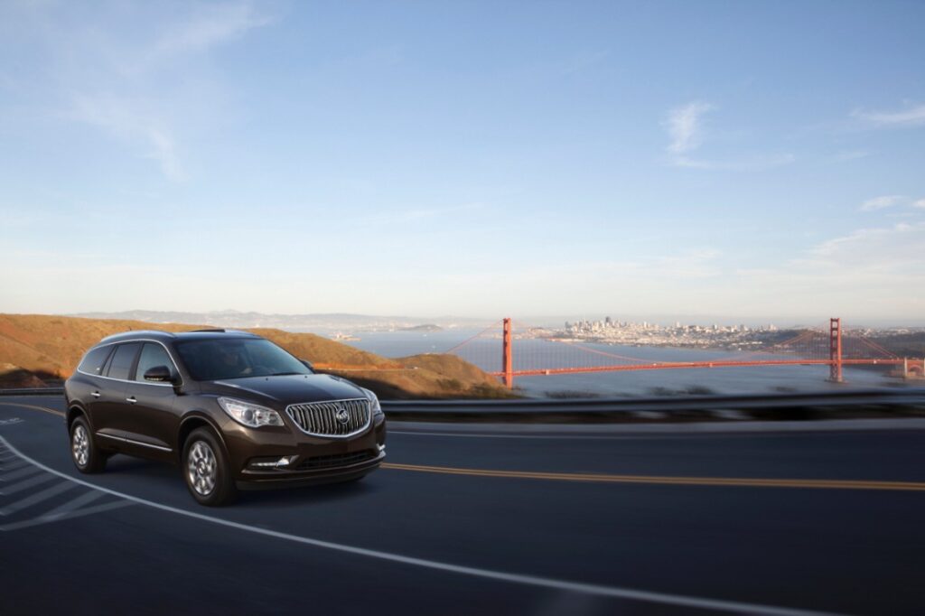 2013 Buick Enclave driving on Highway 1
