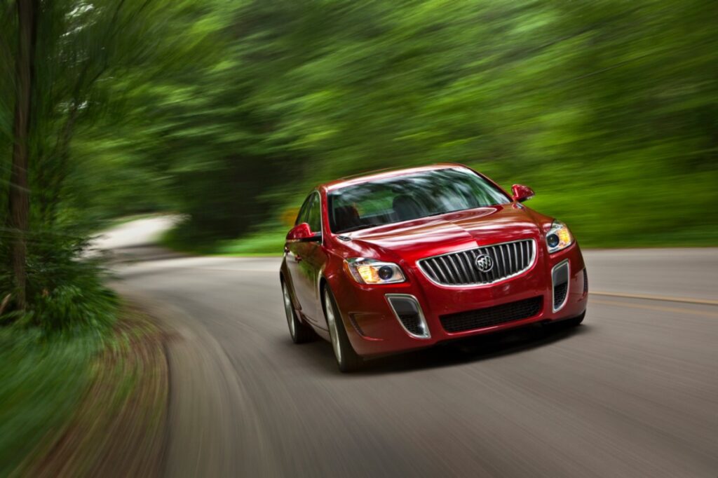2013 Buick Regal GS driving on a winding road