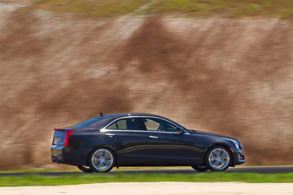 2013 Cadillac ATS driving on highway