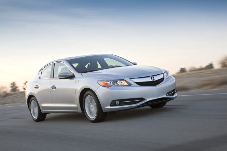2013 Acura ILX driving on highway