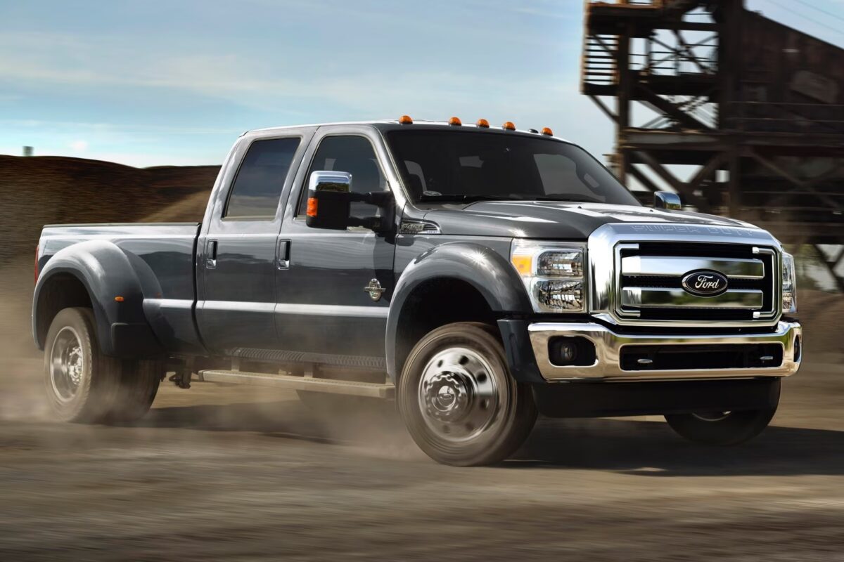 2015 Ford F-450 Super Duty driving through worksite