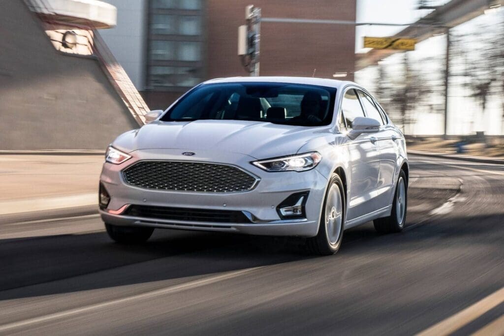 2019 Ford Fusion Hybrid driving through the city