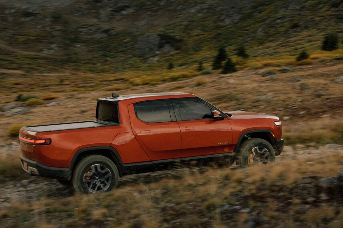 2022 Rivian R1T driving on mountain road