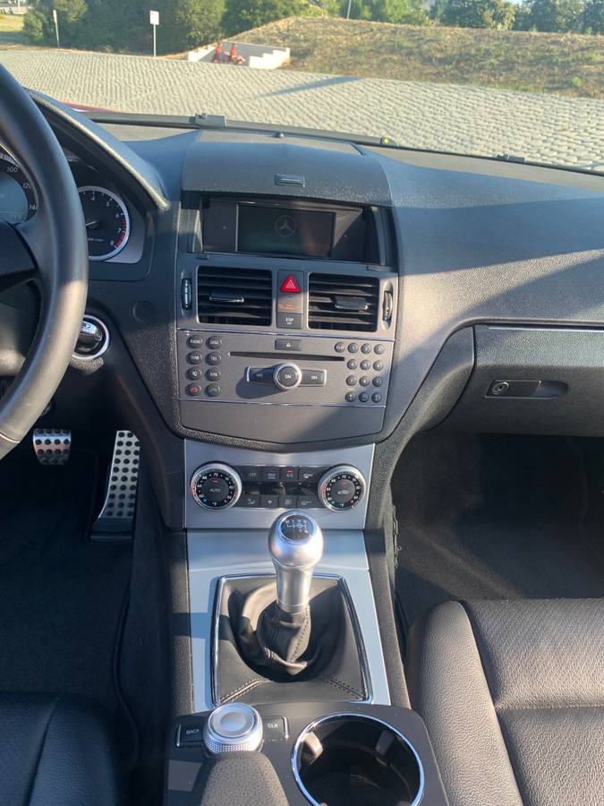 2010 Mercedes-Benz C300 interior center stack, gearshift, and dashboard