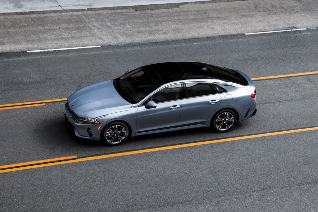 2021 Kia K5 driving on city streets