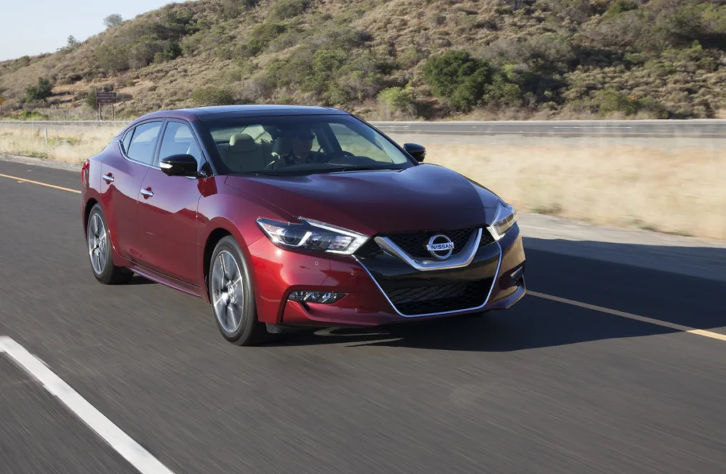 2017 Nissan Maxima driving on highway